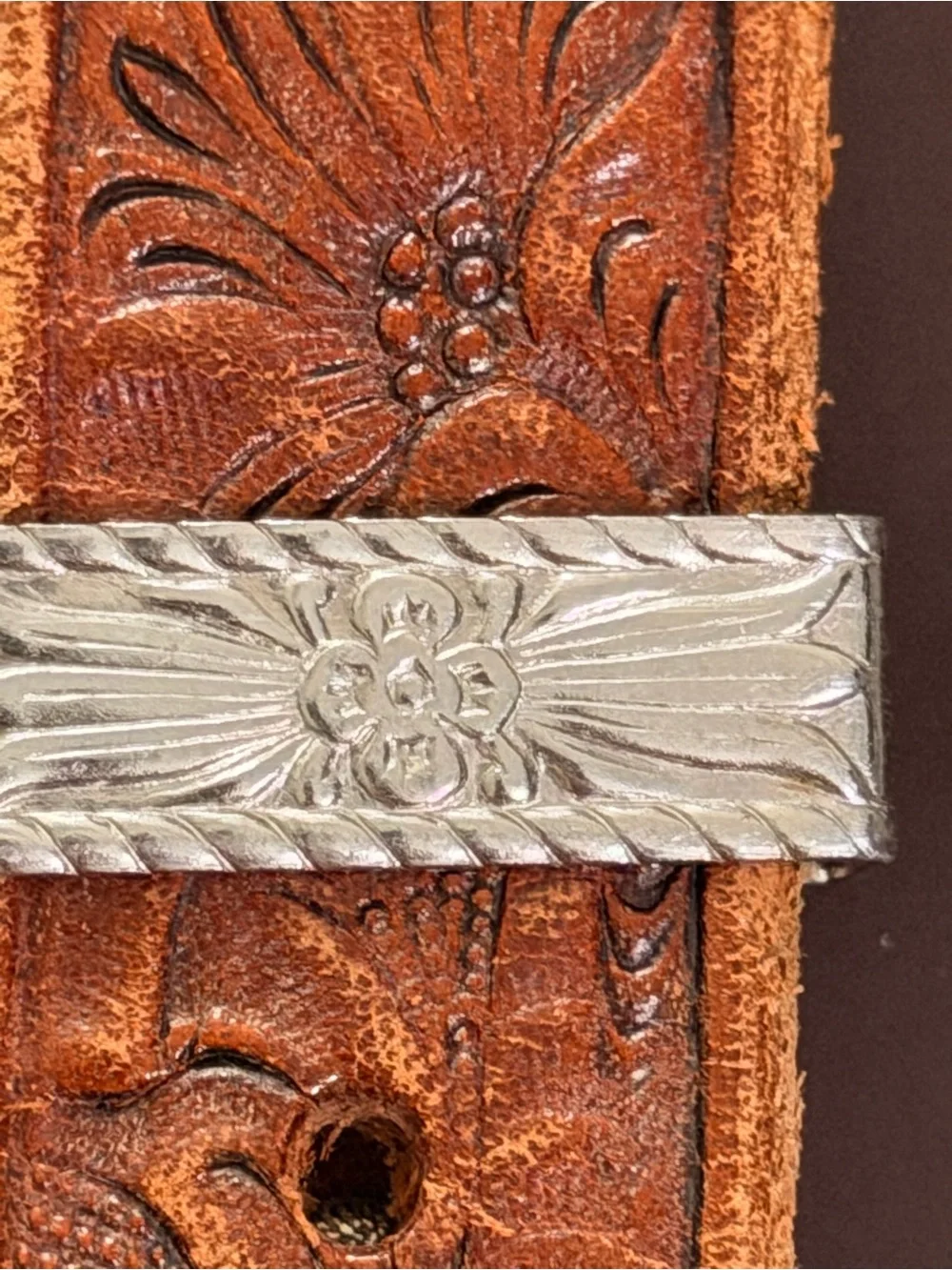 Vintage Western tooled leather belt with a three-piece engraved silver-tone 26